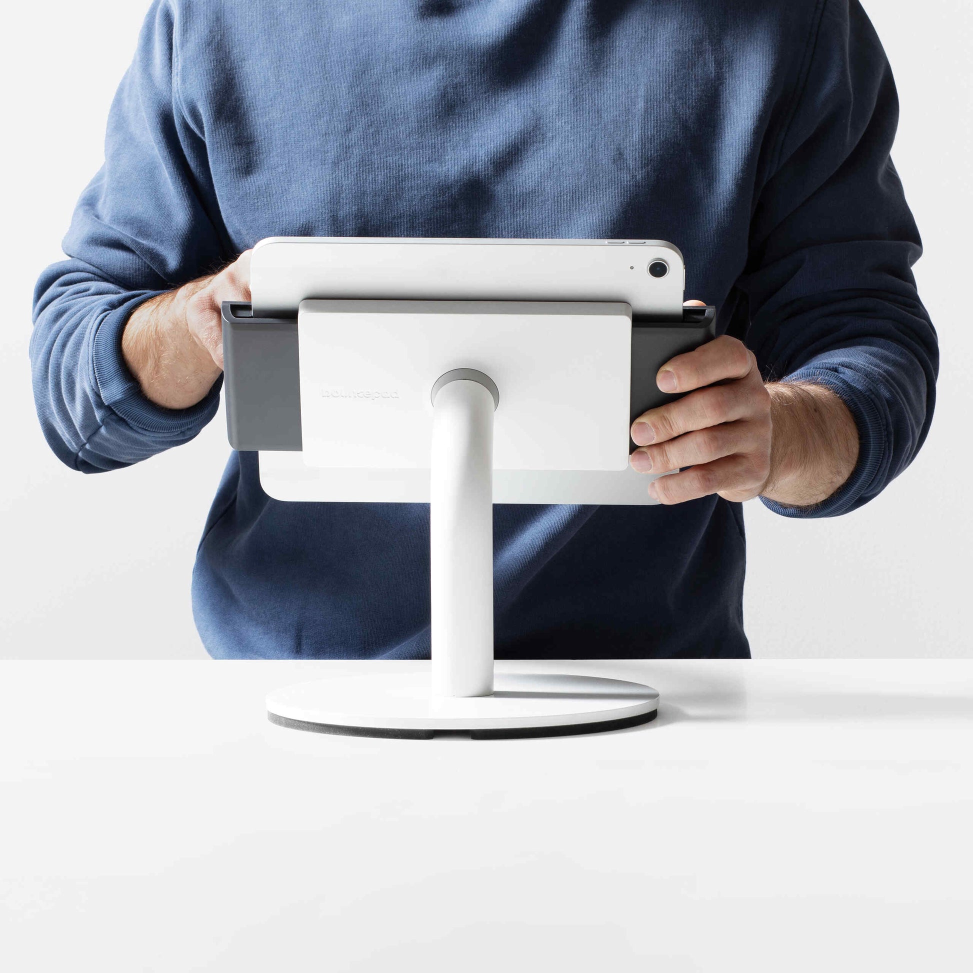 Bouncepad Clip Counter 60 Tablet Stand in white, front view, shown in use