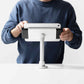 Bouncepad Clip Flex Tablet Desk Mount in white, shown in use