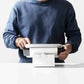 Bouncepad Clip Flip Tablet Stand in white, shown in use