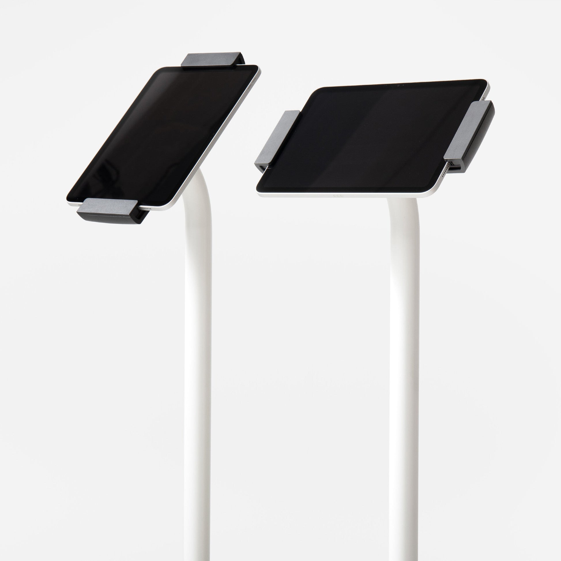 Bouncepad Clip Floorstanding Tablet Floor Stand in white, portrait and landscape orientation