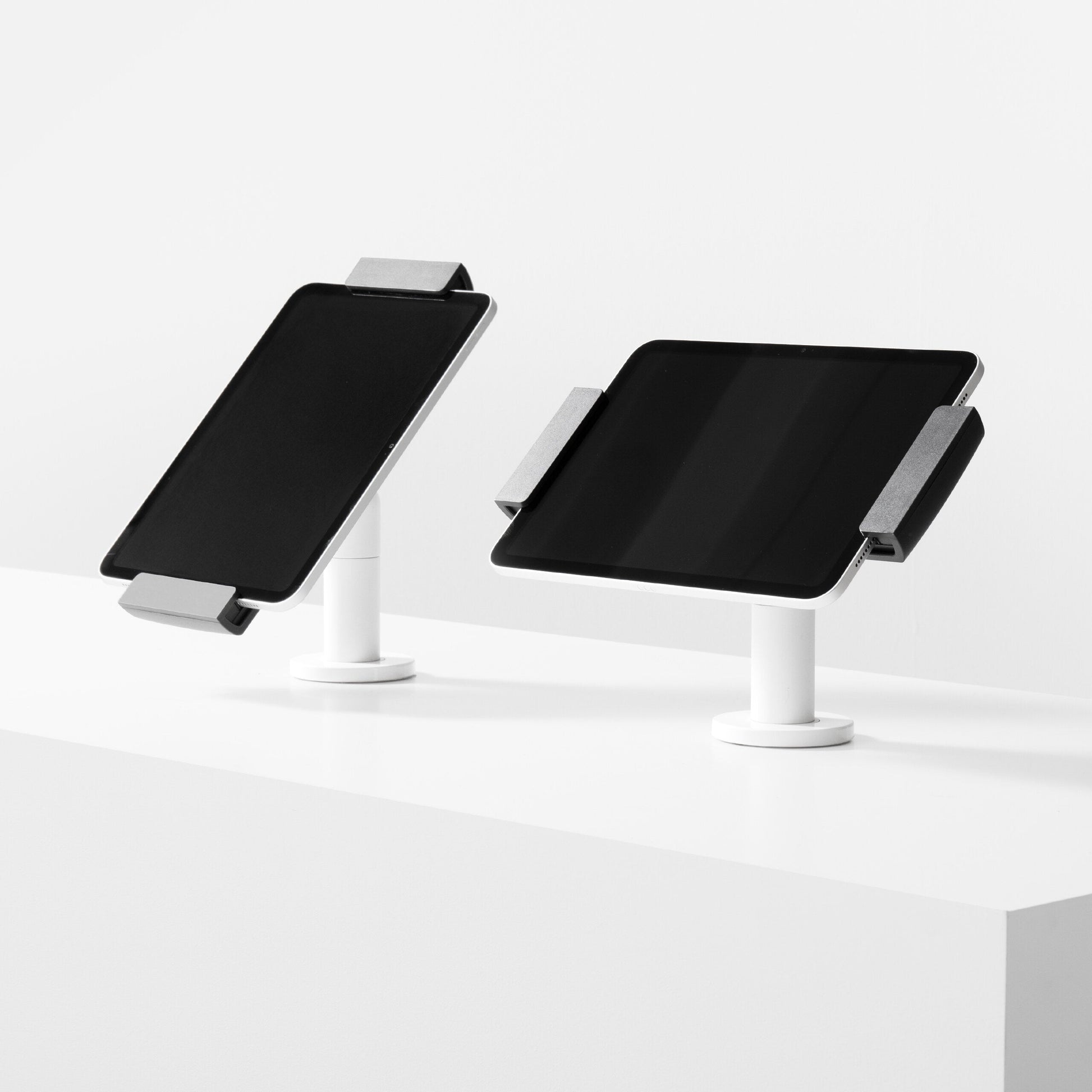 Bouncepad Clip Twist-Mini Tablet Desk Mount in white, portrait and landscape orientation