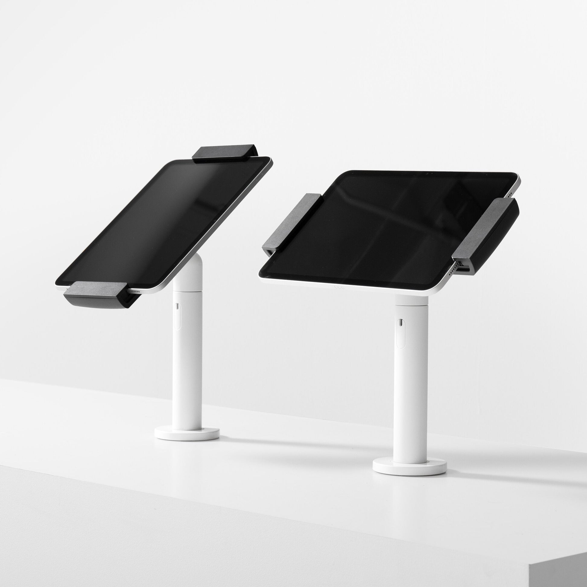 Bouncepad Clip Twist Tablet Desk Mount in white, portrait and landscape orientation