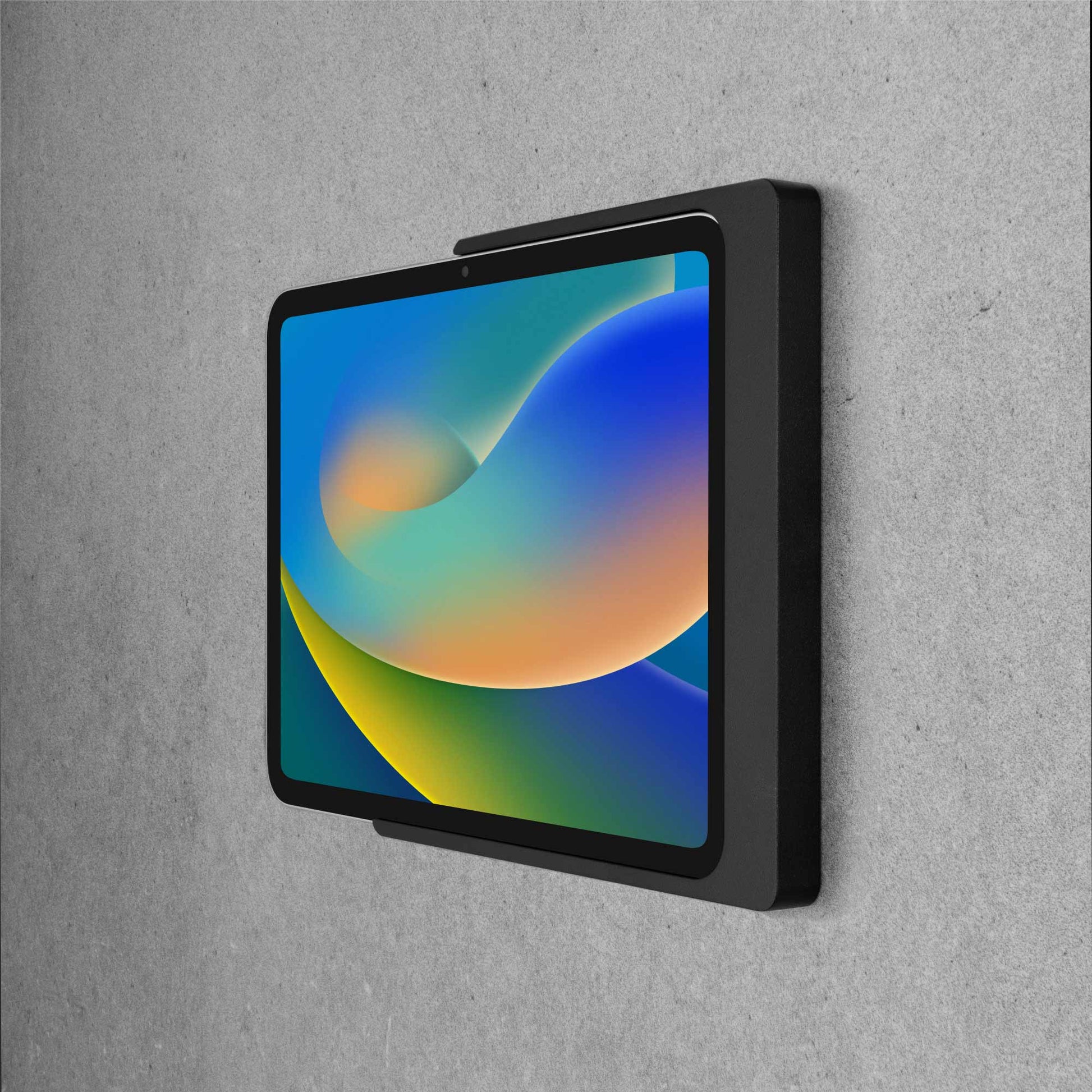 Displine Companion Wall Home iPad Wall Mount for iPad 10th generation 10.9-inch and iPad 11th generation A16 11-inch, in black, side view, on concrete wall