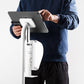 Bouncepad Core Elevate + Brother Printer Mount Tablet Floor Stand in white, shown in use