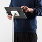 Bouncepad Core Elevate Tablet Floor Stand in white, shown in use