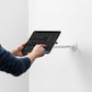 Bouncepad Core Reach Tablet Wall Mount in white, shown in use