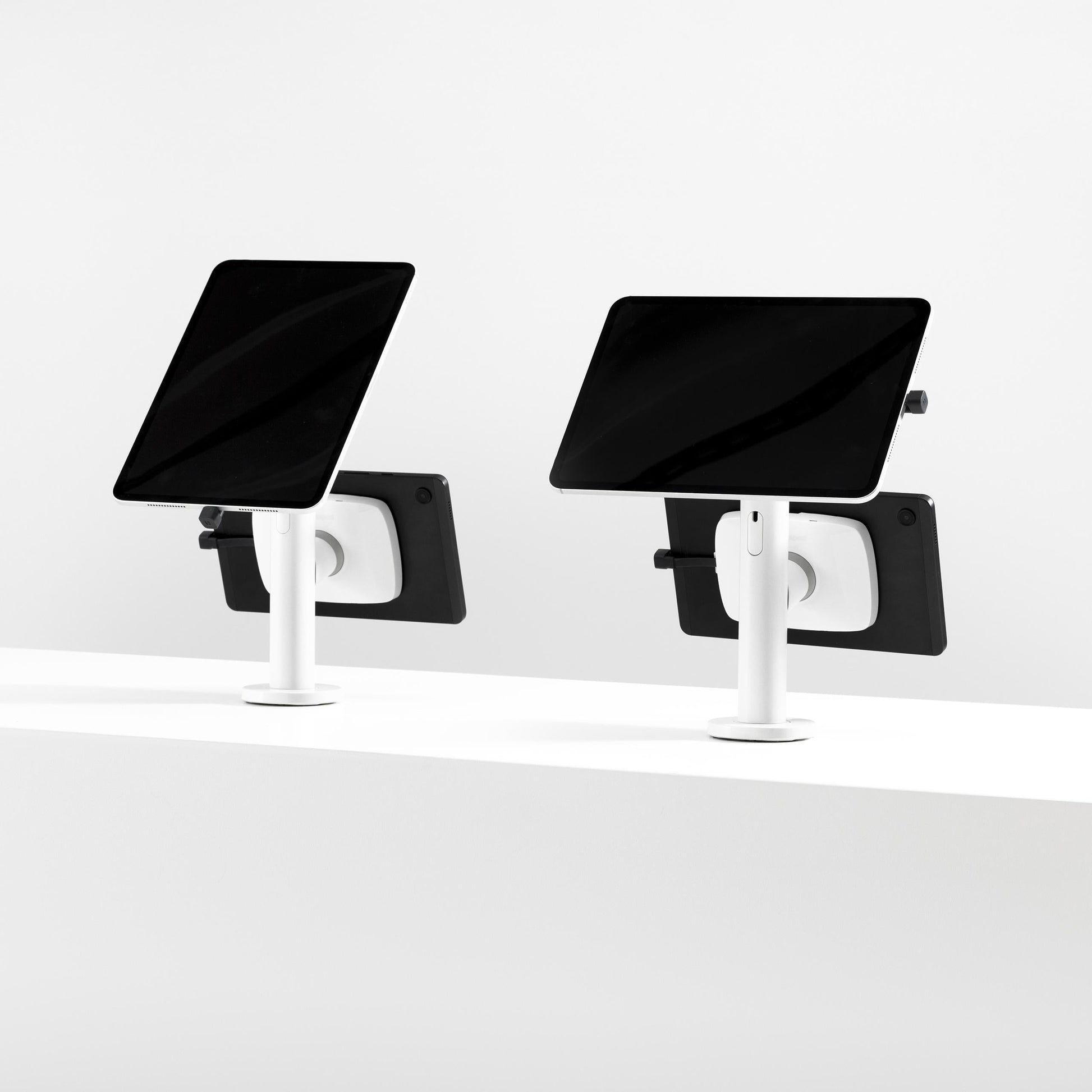 Bouncepad Core Twin Tablet Desk Mount in white, portrait and landscape orientation