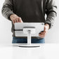 Bouncepad Core Counter Twist-Mini Tablet Stand in white, shown in use