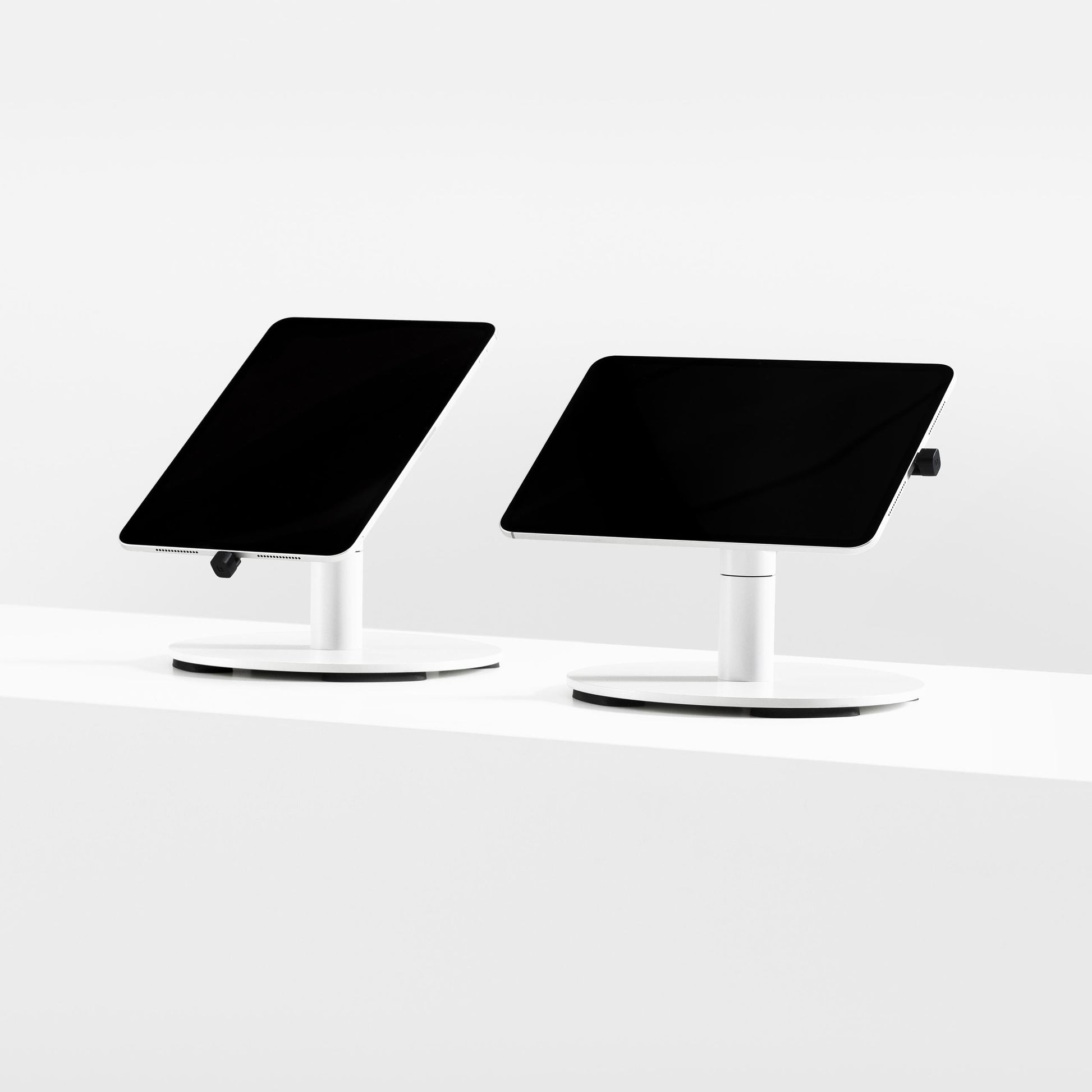 Bouncepad Core Counter Twist-Mini Tablet Stand in white, portrait and landscape orientation
