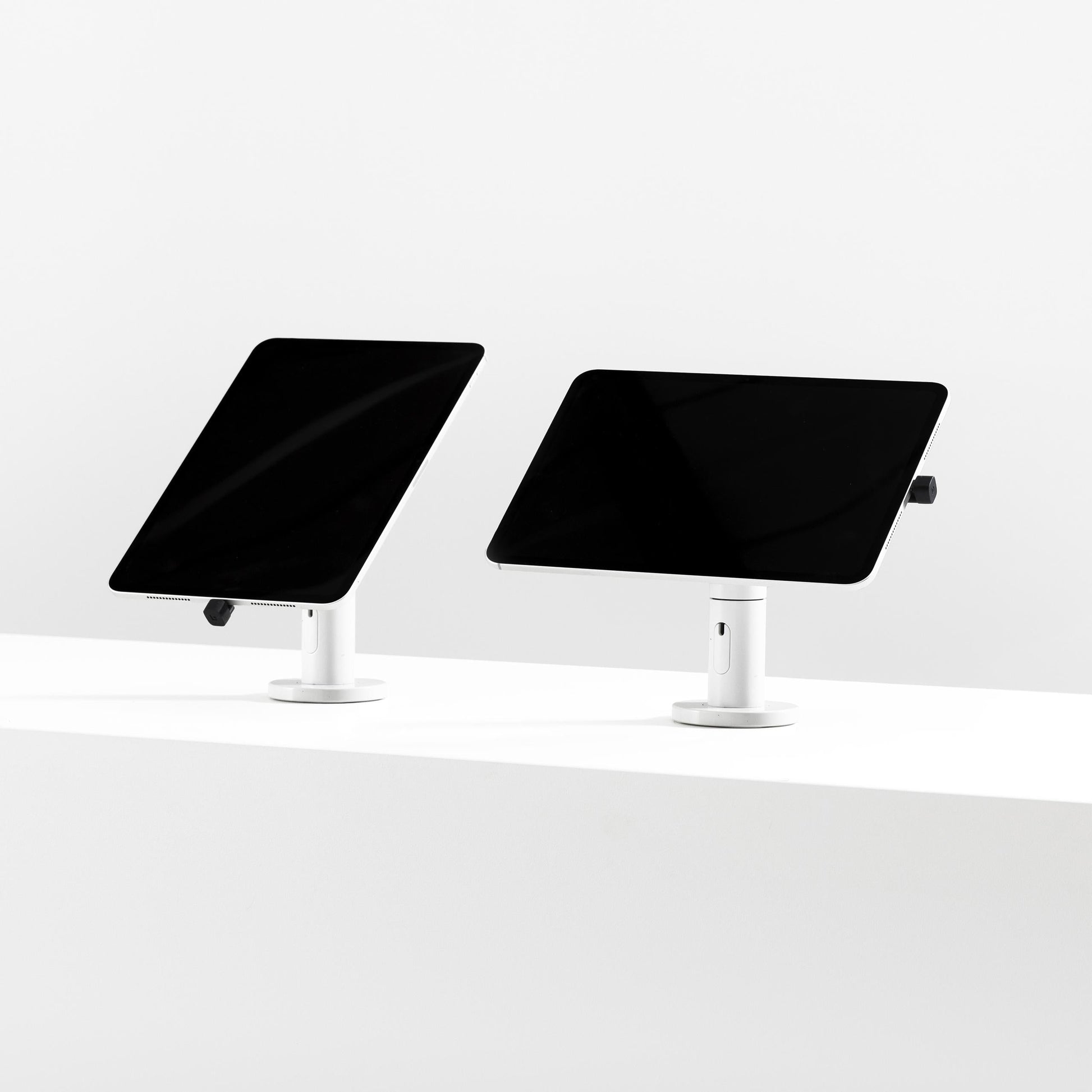 Bouncepad Core Twist-Mini Tablet Desk Mount in white, portrait and landscape orientation