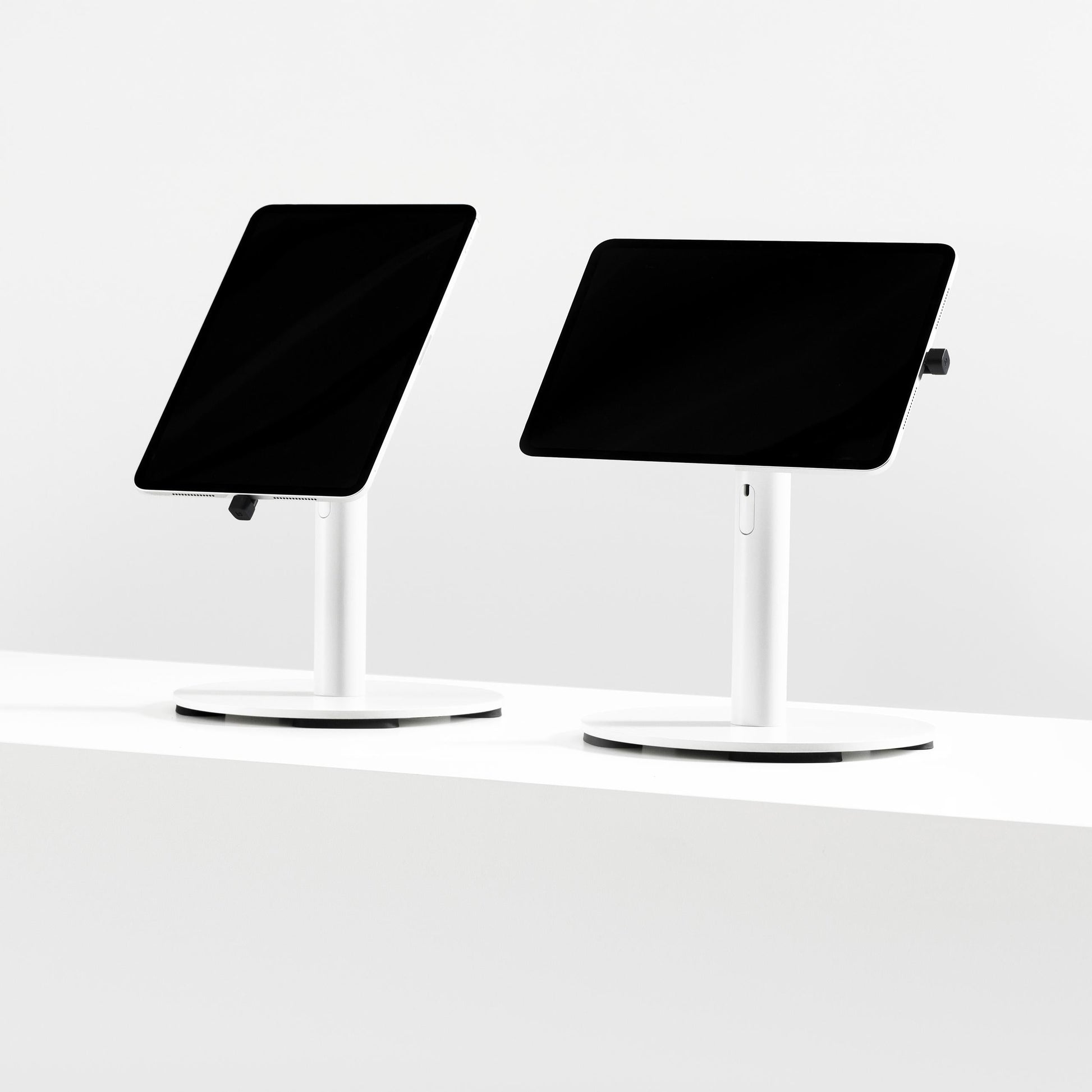 Bouncepad Core Counter Twist Tablet Stand in white, portrait and landscape orientation