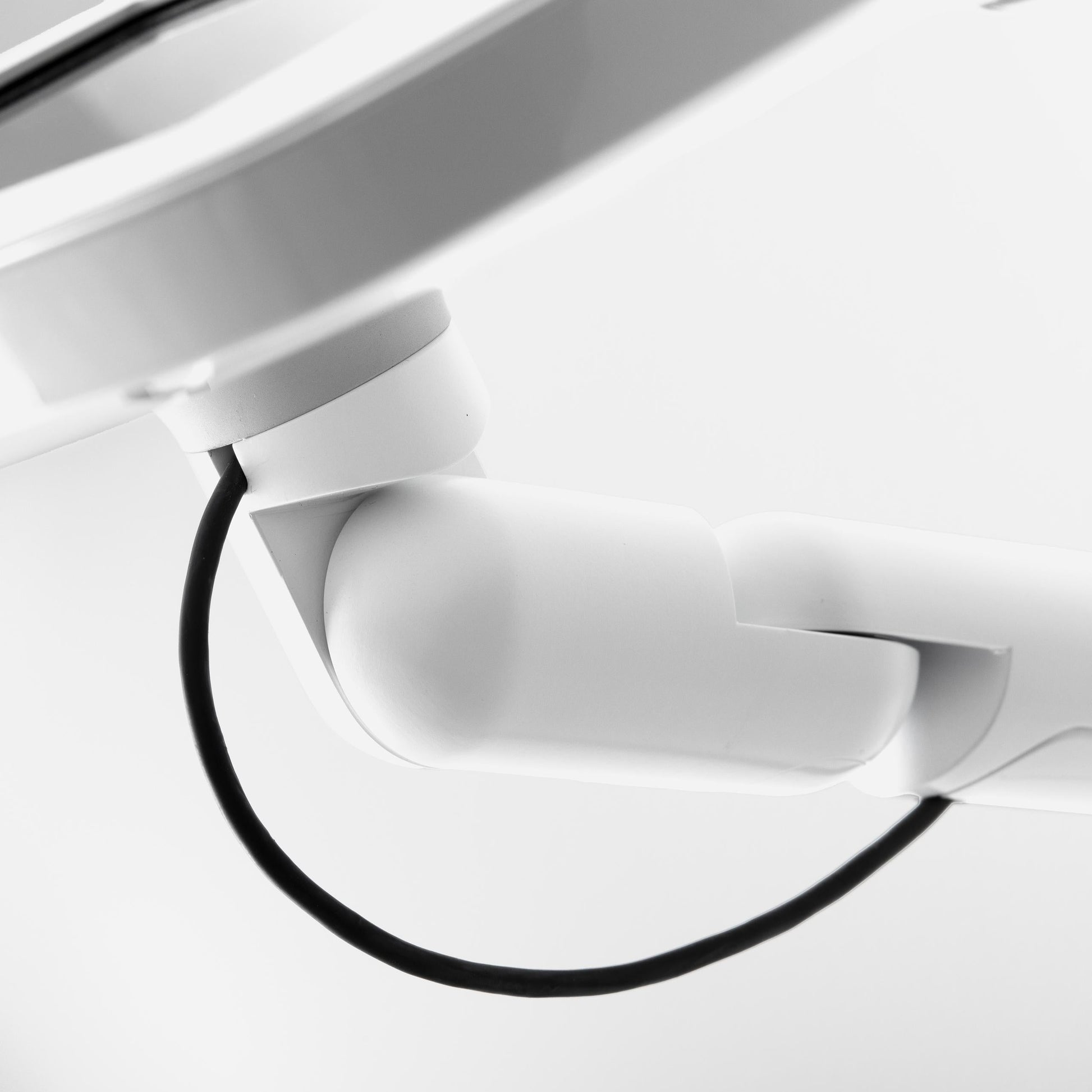 Bouncepad Original Reach Tablet Wall Mount in white, cable management, detail view