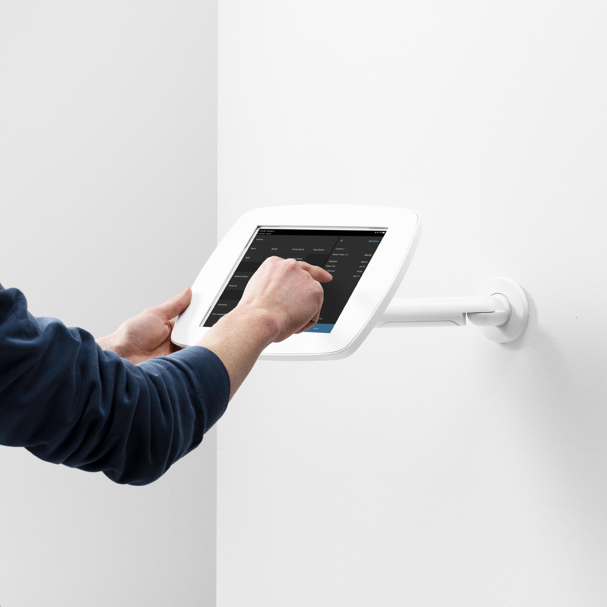 Bouncepad Original Reach Tablet Wall Mount in white, shown in use