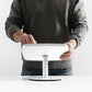 Bouncepad Original Counter Twist-Mini Tablet Stand in white, shown in use