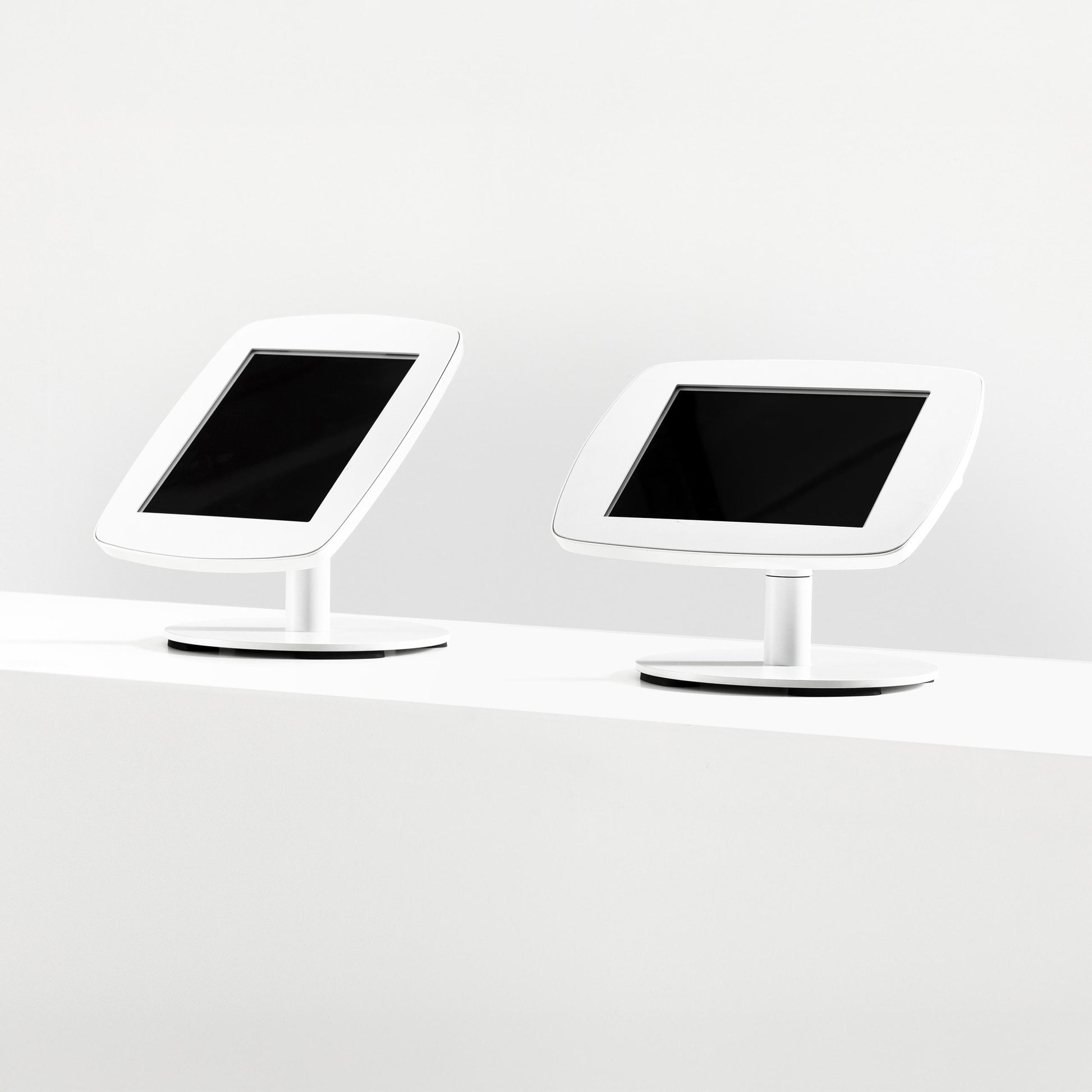 Bouncepad Original Counter Twist-Mini Tablet Stand in white, portrait and landscape orientation