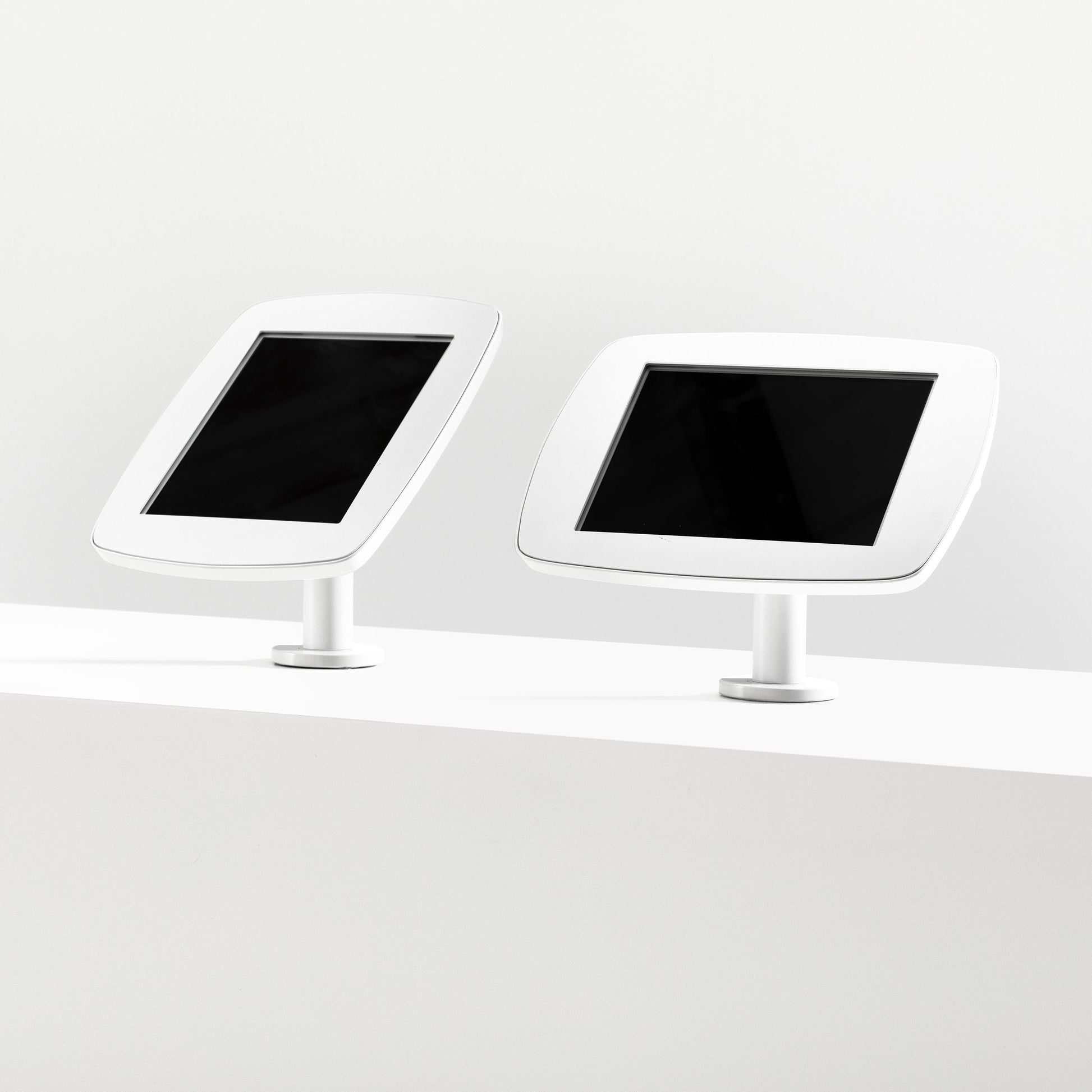Bouncepad Original Twist-Mini Tablet Desk Mount in white, portrait and landscape orientation