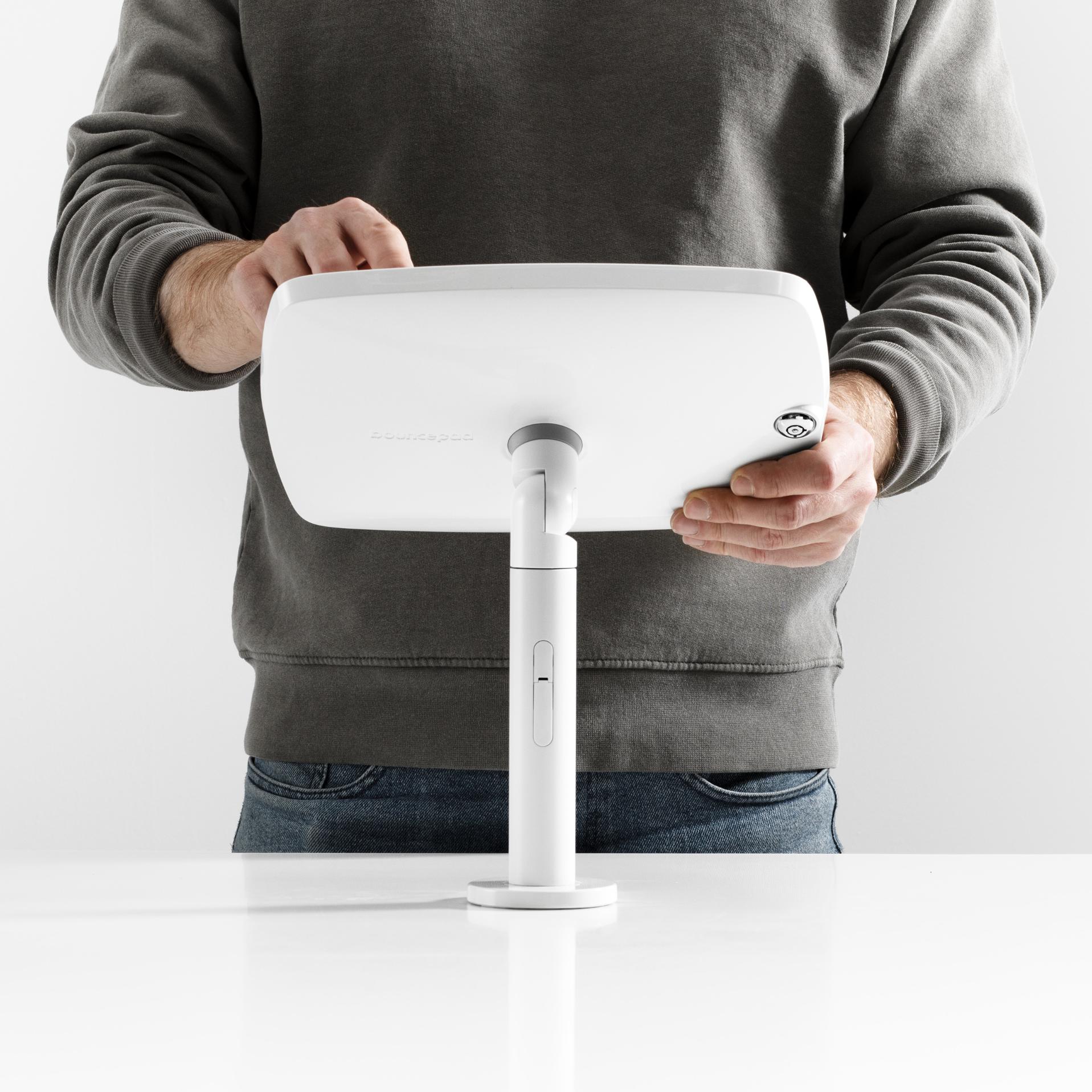 Bouncepad Original Twist Tablet Desk Mount in white, shown in use